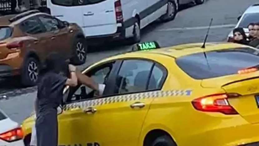 Taksi sürücüsü gənc qadını yumruqlayıb
