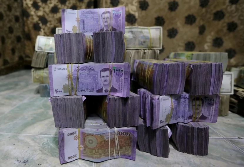 Suriyada əsginaslardan Əsədin ailəsinin portretlərini YIĞIŞDIRDILAR