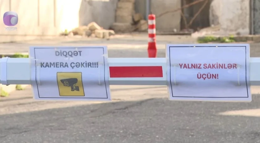 Binanın girişi şlaqbaum ilə qanunsuz BAĞLANDI